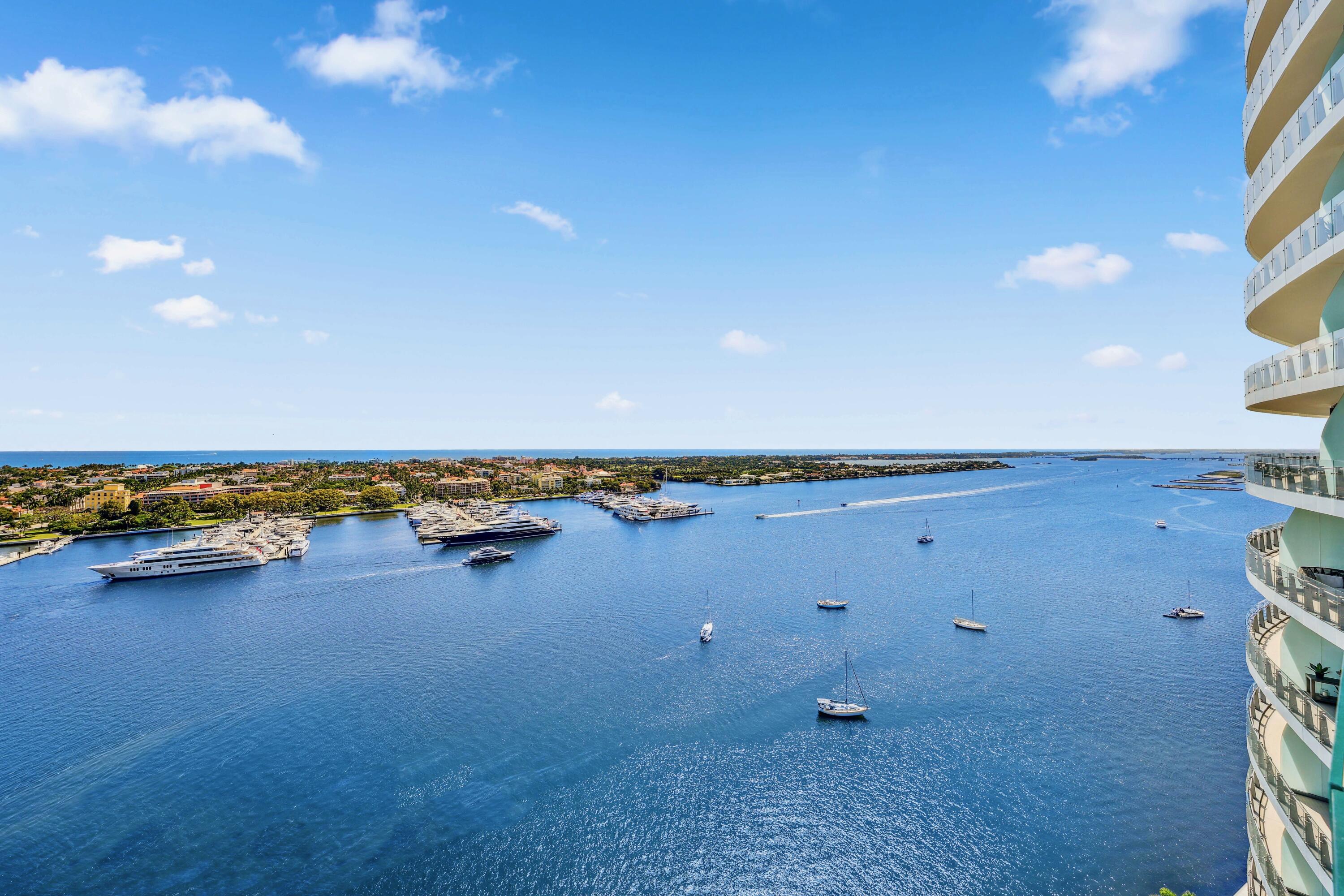1100 South Flagler Drive, Unit 1801 West Palm Beach, FL 33401 - Photo 32 of 56 a view of a lake with beach and lake view