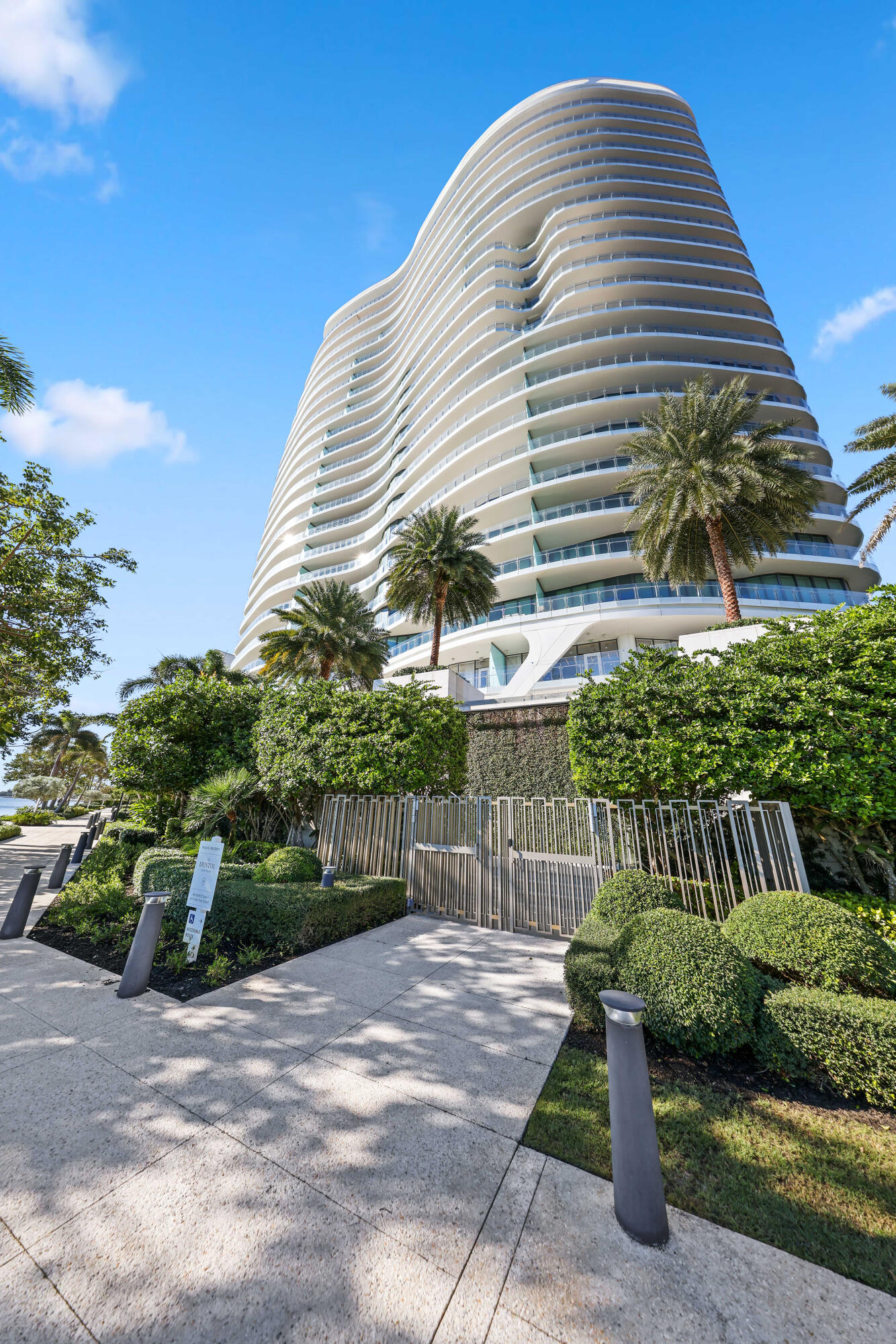 1100 South Flagler Drive, Unit 1801 West Palm Beach, FL 33401 - Photo 5 of 56 a front view of a house with garden