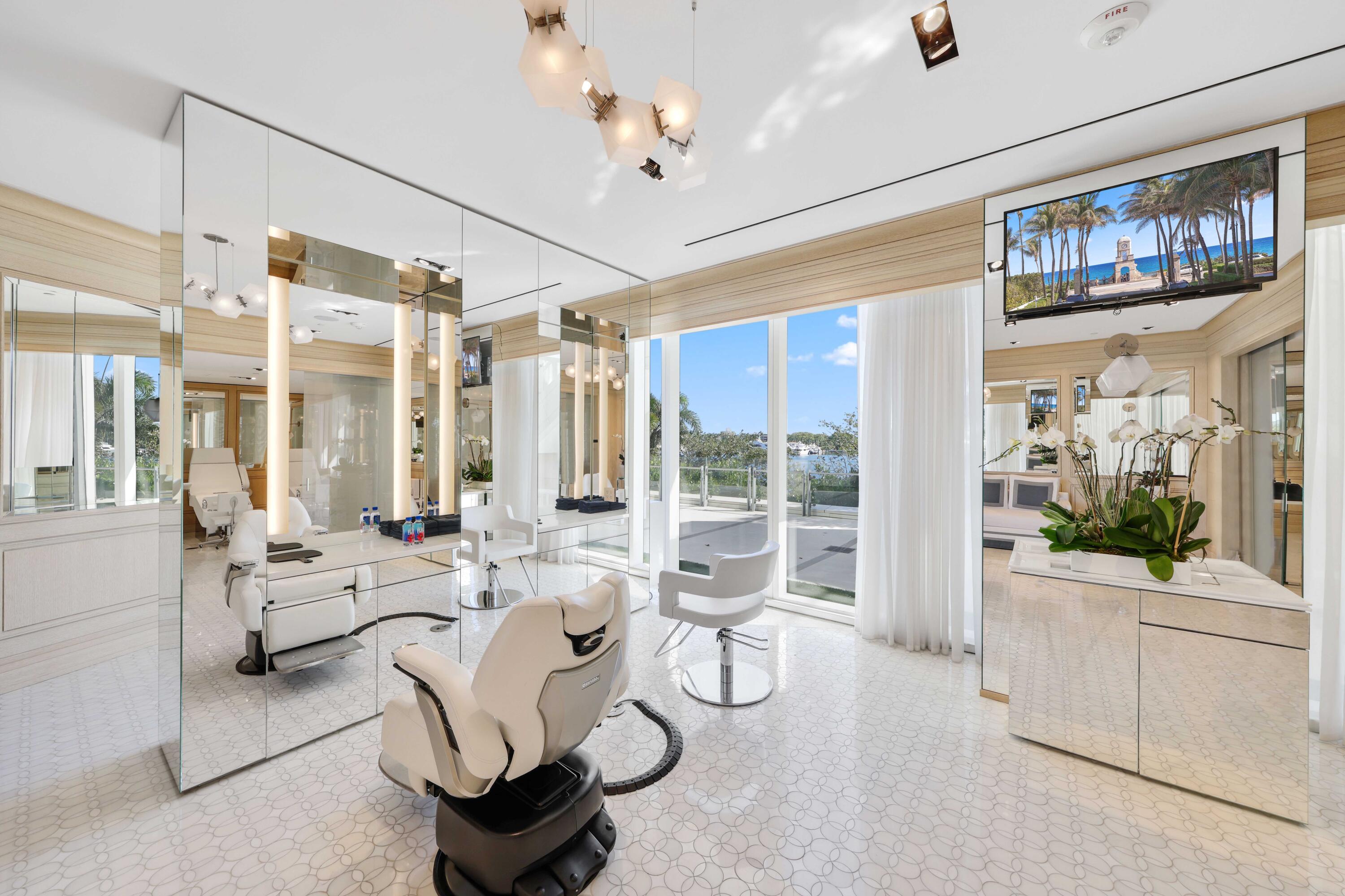 1100 South Flagler Drive, Unit 1801 West Palm Beach, FL 33401 - Photo 52 of 56 a living room with furniture and a large window