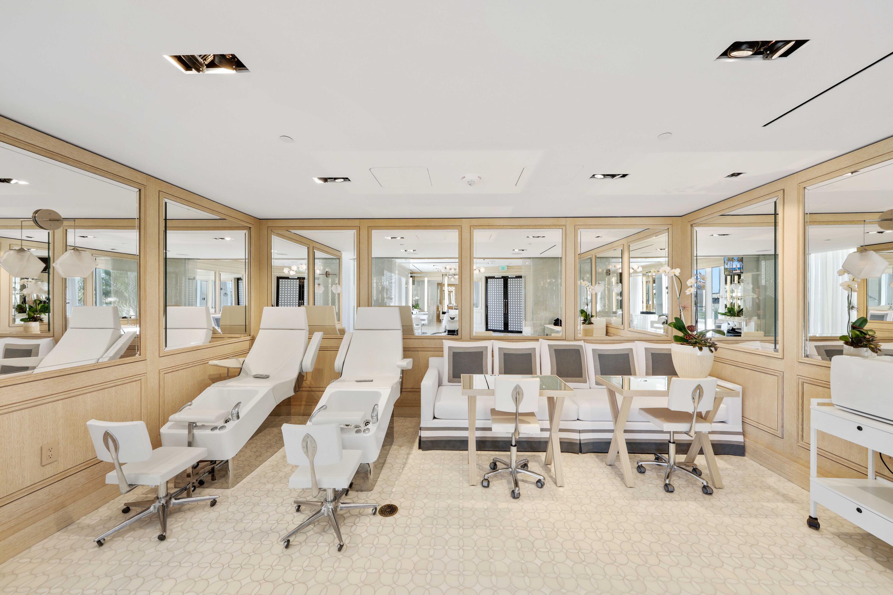 1100 South Flagler Drive, Unit 1801 West Palm Beach, FL 33401 - Photo 53 of 56 a living room with furniture large window and glass table