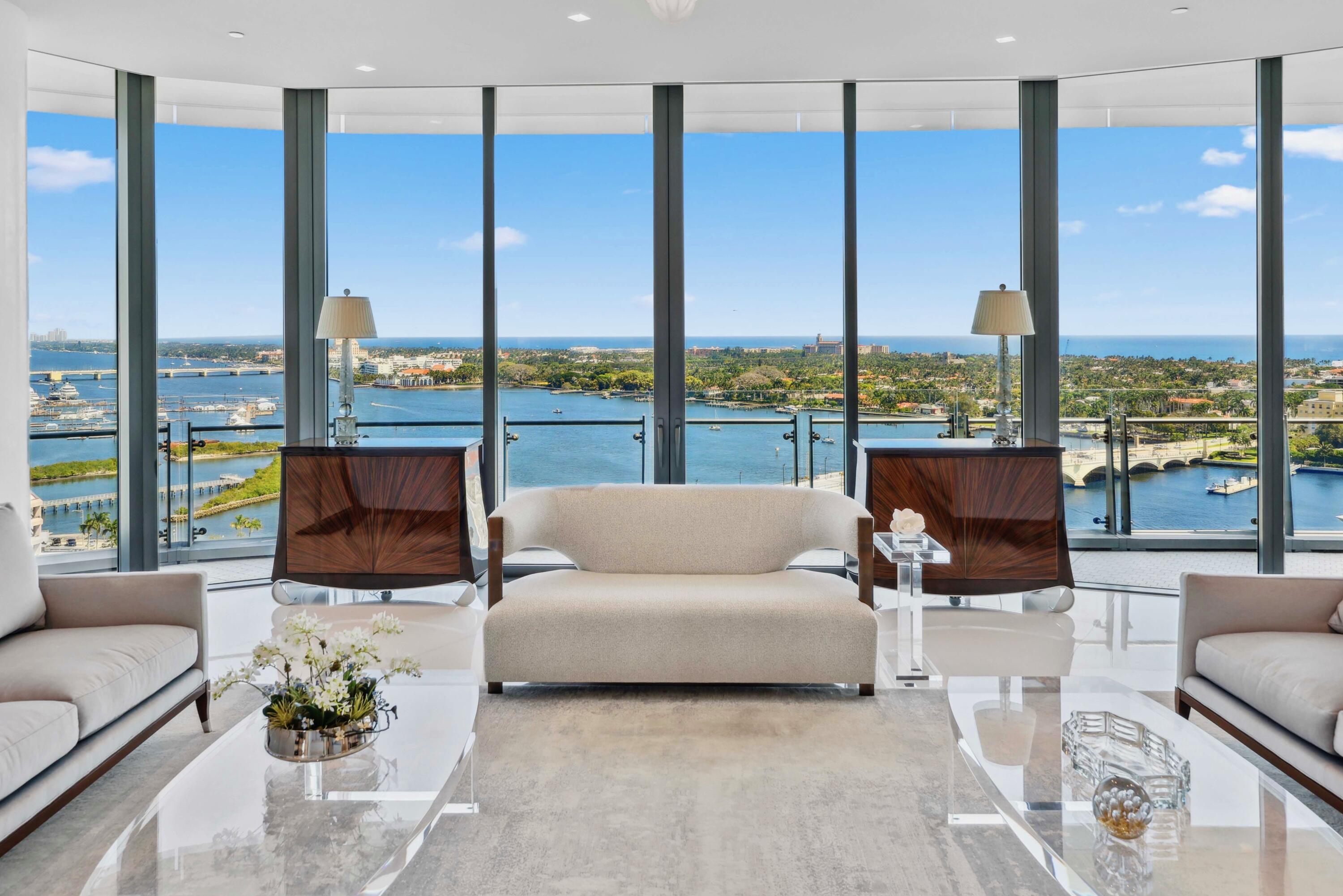 1100 South Flagler Drive, Unit 1801 West Palm Beach, FL 33401 - Photo 9 of 56 a living room with furniture and a floor to ceiling window