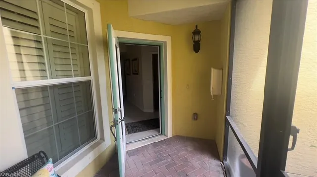 a view of a street with a building in the background