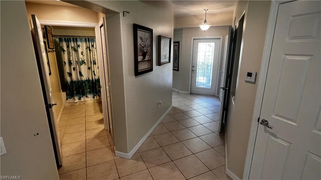 5705 Mayflower Way Ave Maria, FL 34142 - Photo 8 of 34 a view of a hallway