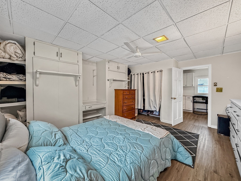 126 Beach Road Salisbury, MA 01952 - Photo 28 of 30 a bedroom with a bed and a television