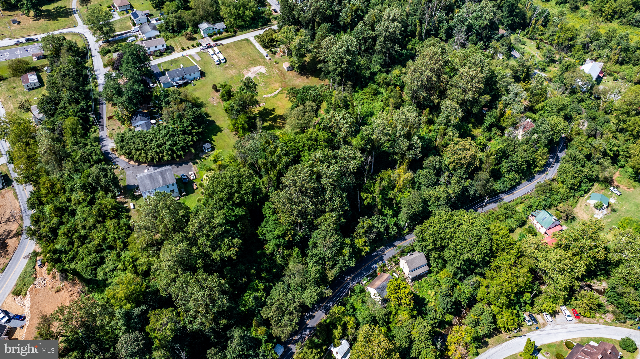 775 Wagontown Road Coatesville, PA 19320 - Photo 2 of 11 an aerial view of residential house with outdoor space and trees all around