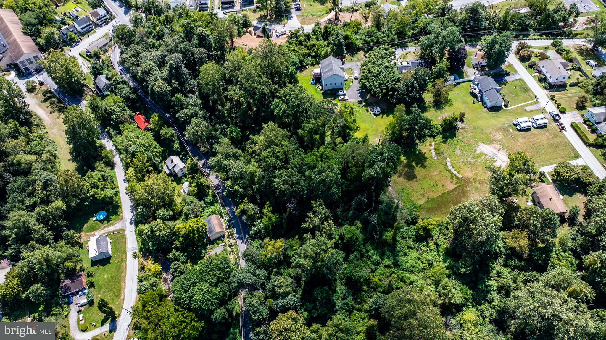 775 Wagontown Road Coatesville, PA 19320 - Photo 3 of 11 an aerial view of residential houses with outdoor space and trees all around