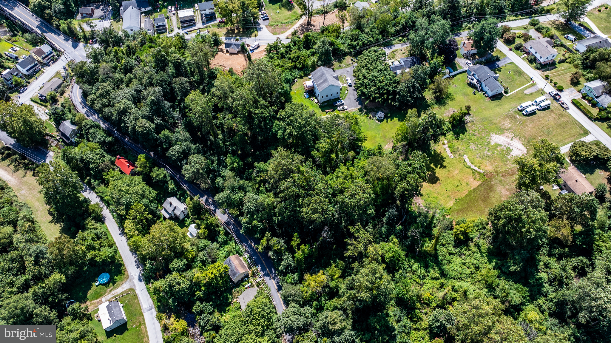 775 Wagontown Road Coatesville, PA 19320 - Photo 7 of 11 an aerial view of residential houses with outdoor space and trees