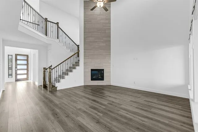 a view of an entryway with wooden floor