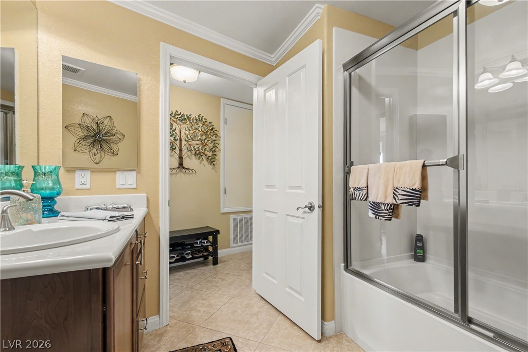 2555 Hampton Road, Unit 3308 Henderson, NV 89052 - Photo 28 of 65 A well-appointed bathroom with a spacious vanity and a convenient shower-tub combination.