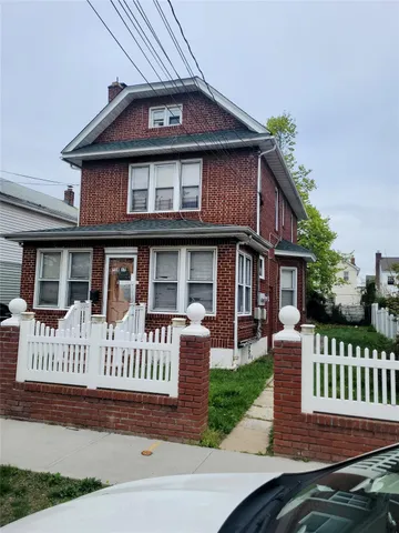 a front view of a house with a porch