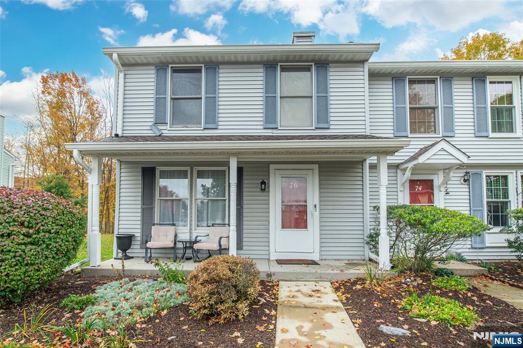 76 Constitution Way, Unit 534 Franklin, NJ 07416 - Photo 2 of 22 a front view of a house with garden