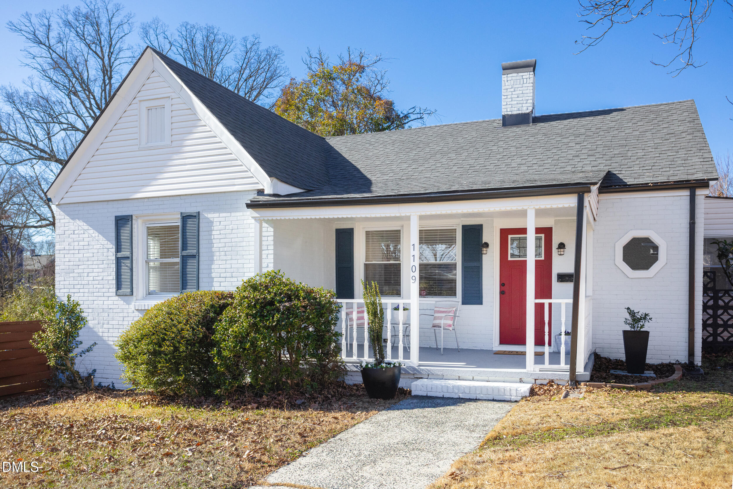 1109 North Elizabeth Street Durham, NC 27701 - Photo 1 of 44 a view of a house with a yard