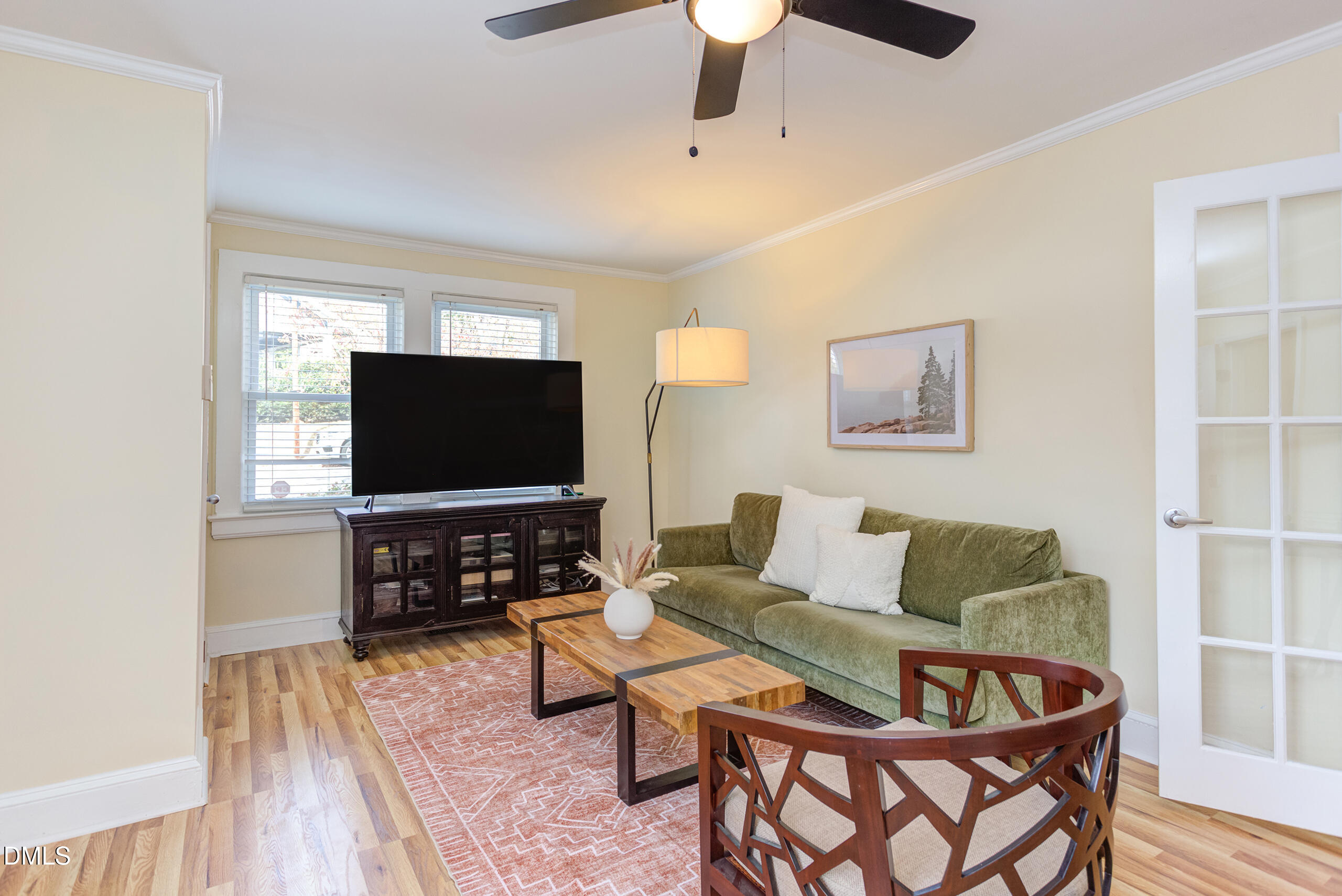 1109 North Elizabeth Street Durham, NC 27701 - Photo 23 of 44 a living room with furniture and a flat screen tv