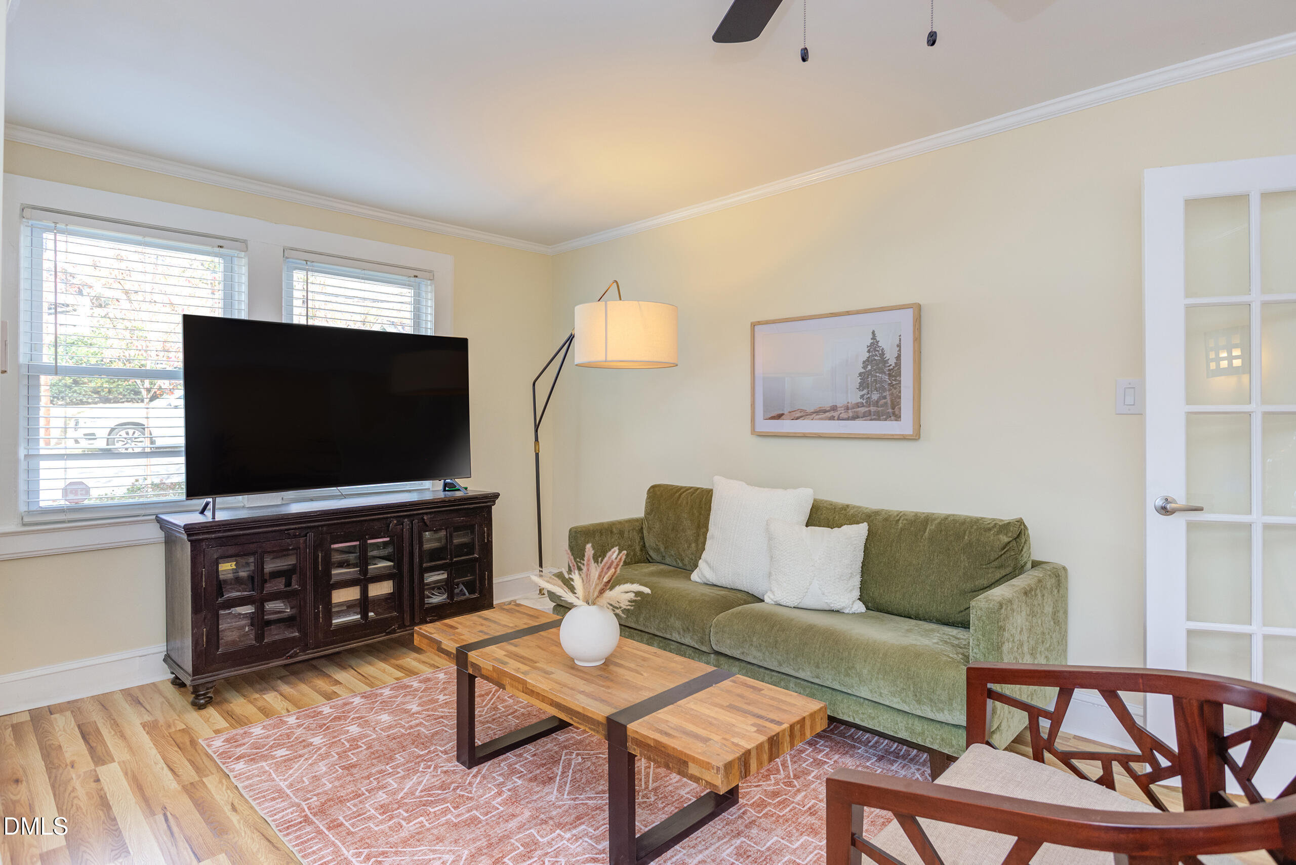 1109 North Elizabeth Street Durham, NC 27701 - Photo 24 of 44 a living room with furniture and a flat screen tv