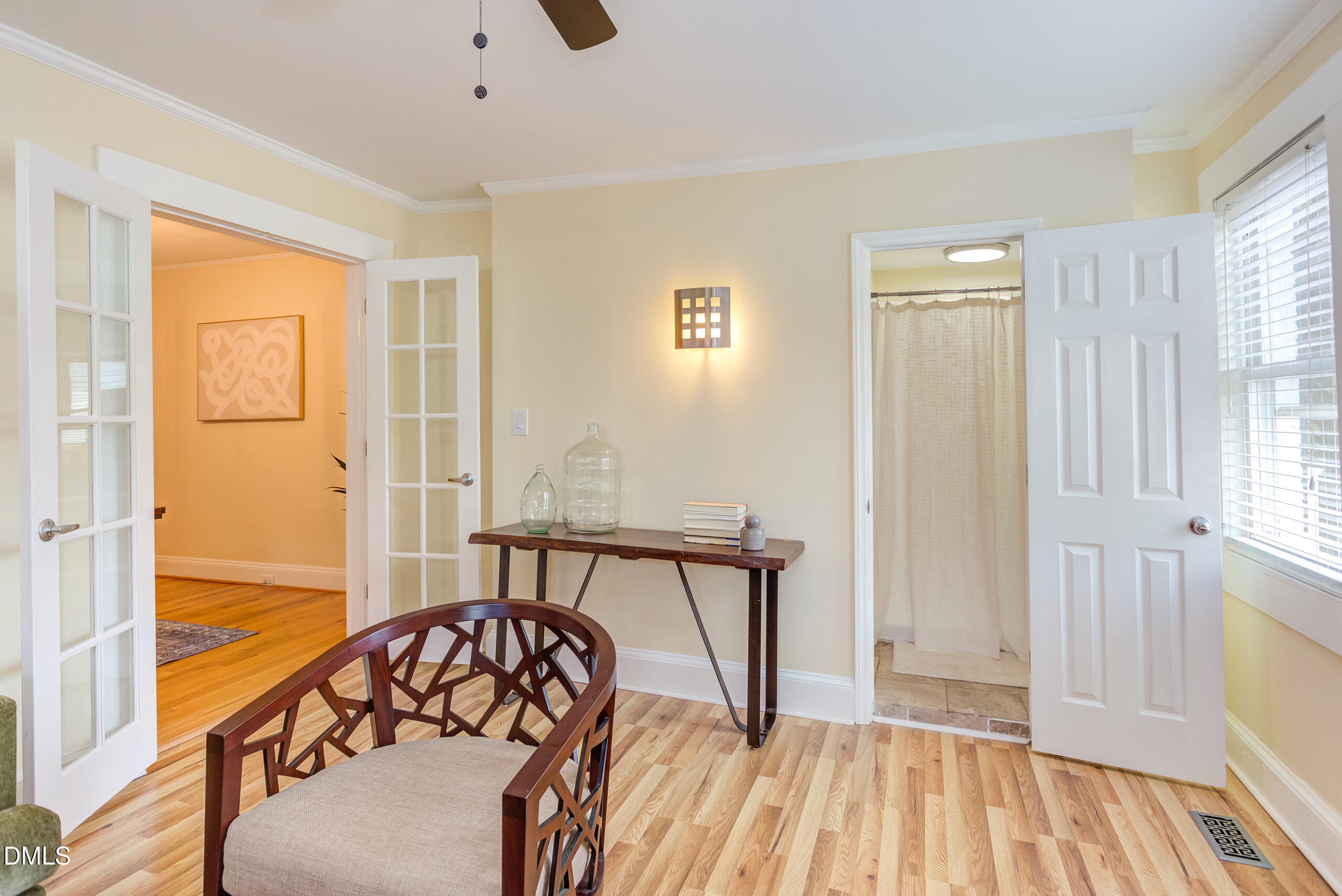 1109 North Elizabeth Street Durham, NC 27701 - Photo 26 of 44 a view of a bedroom with furniture and windows