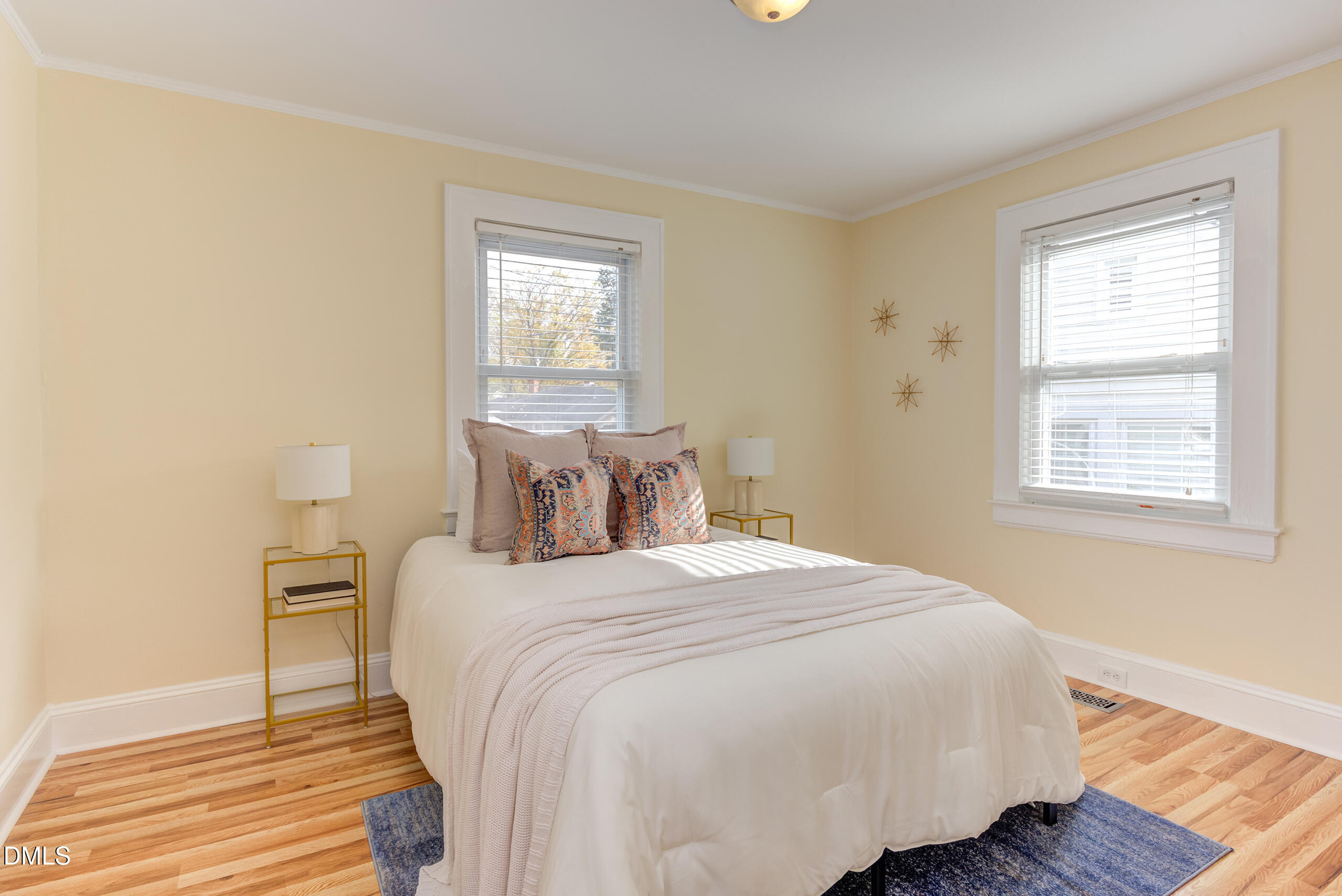 1109 North Elizabeth Street Durham, NC 27701 - Photo 29 of 44 a bedroom with a bed and a window