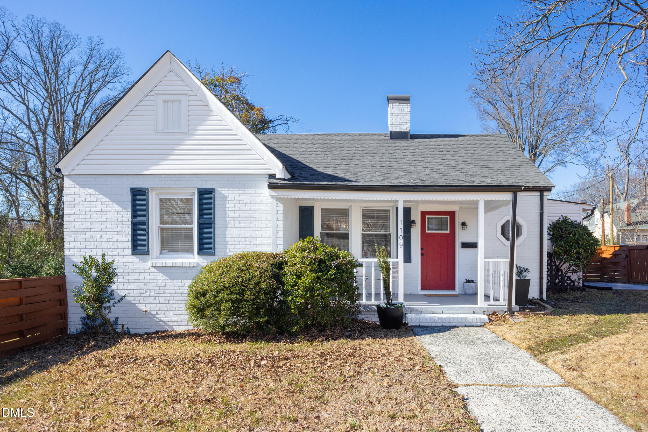 1109 North Elizabeth Street Durham, NC 27701 - Photo 3 of 44 a front view of a house with a yard