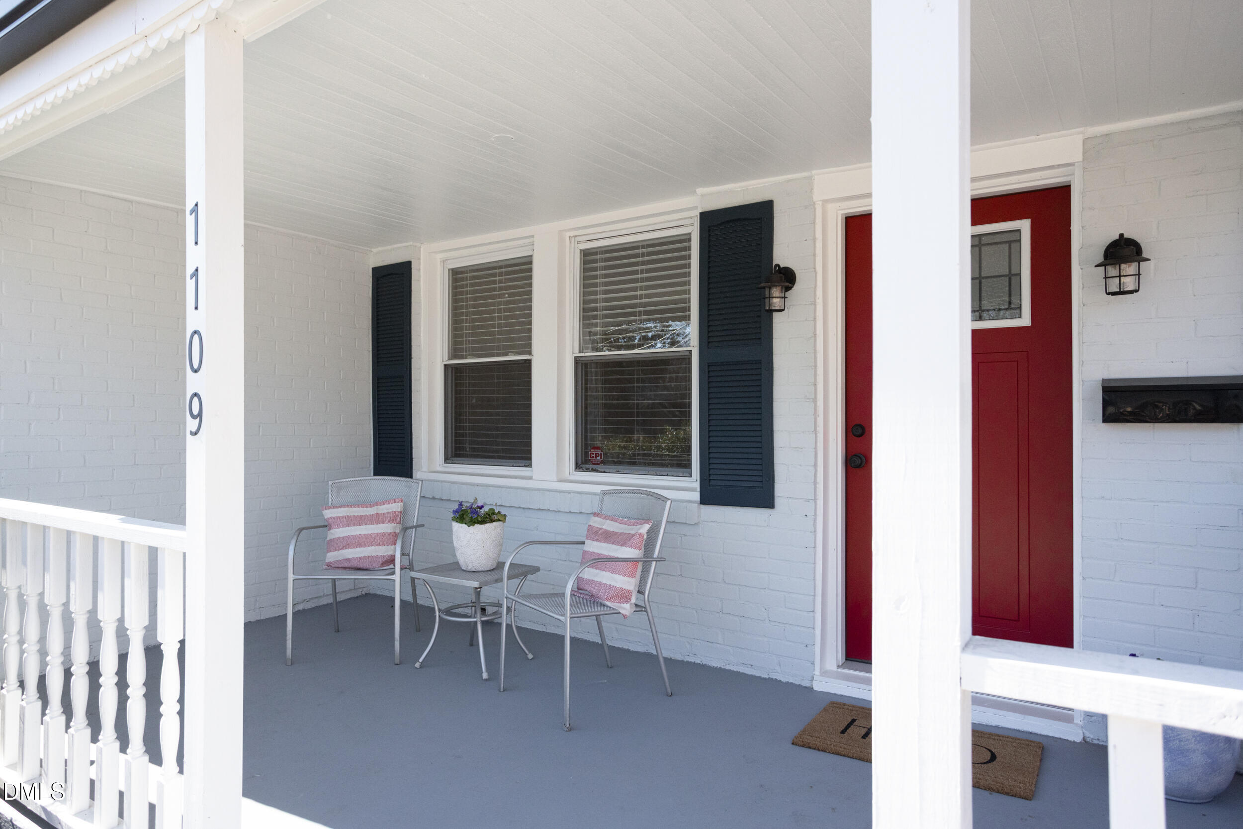 1109 North Elizabeth Street Durham, NC 27701 - Photo 4 of 44 a outdoor space with a couch and a window