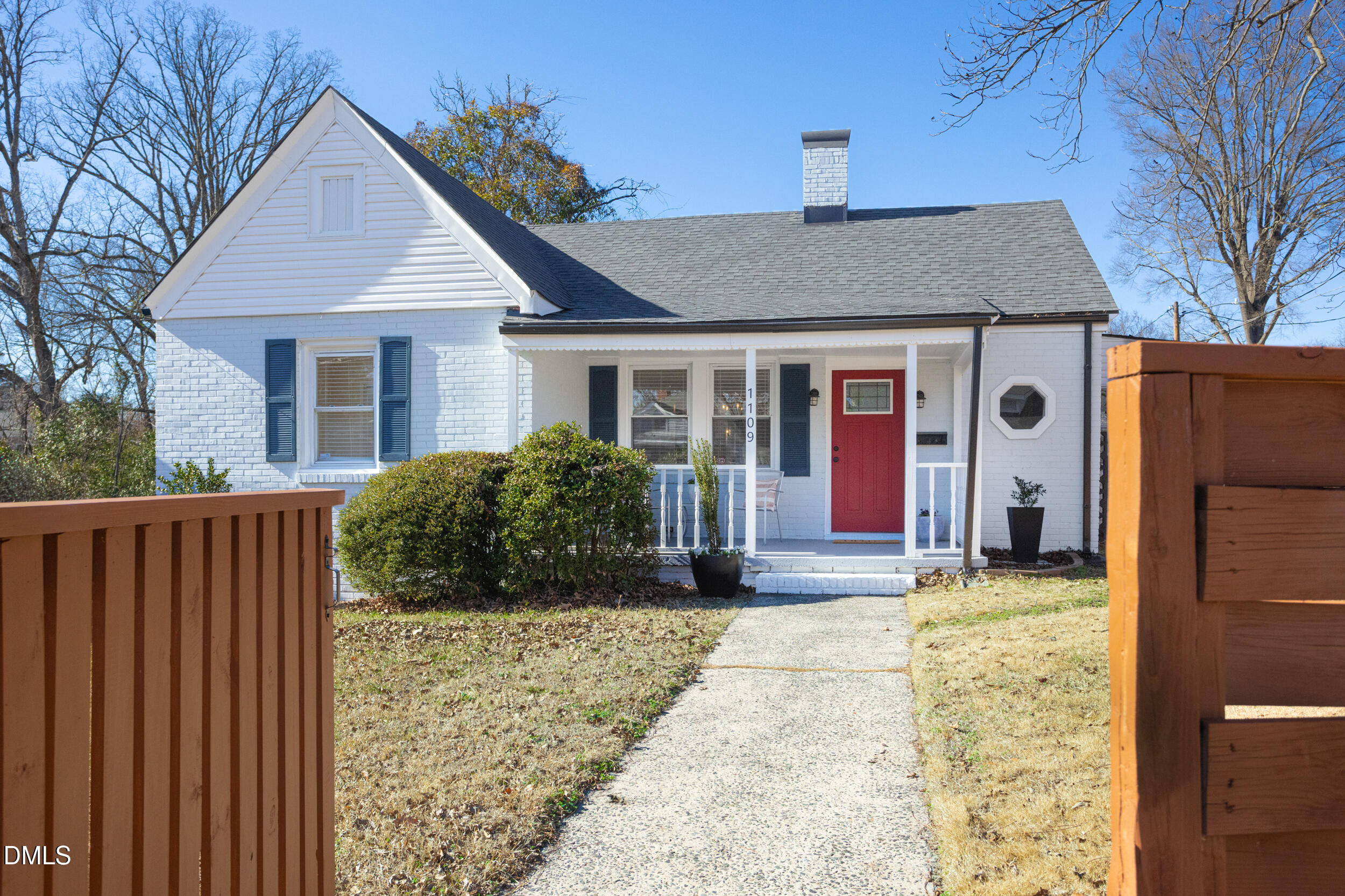 1109 North Elizabeth Street Durham, NC 27701 - Photo 5 of 44 a front view of a house with garden