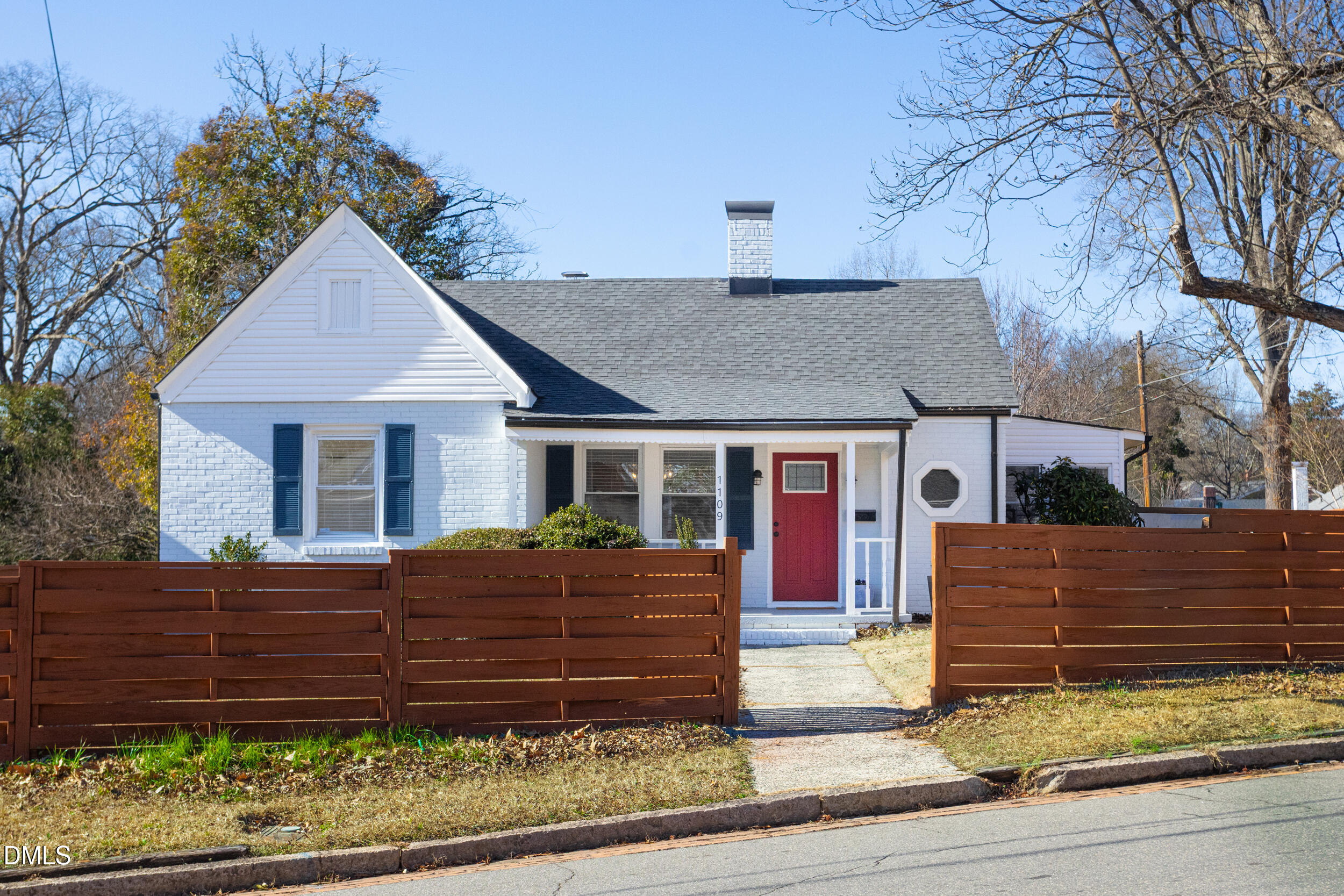 1109 North Elizabeth Street Durham, NC 27701 - Photo 6 of 44 a front view of a house with a yard