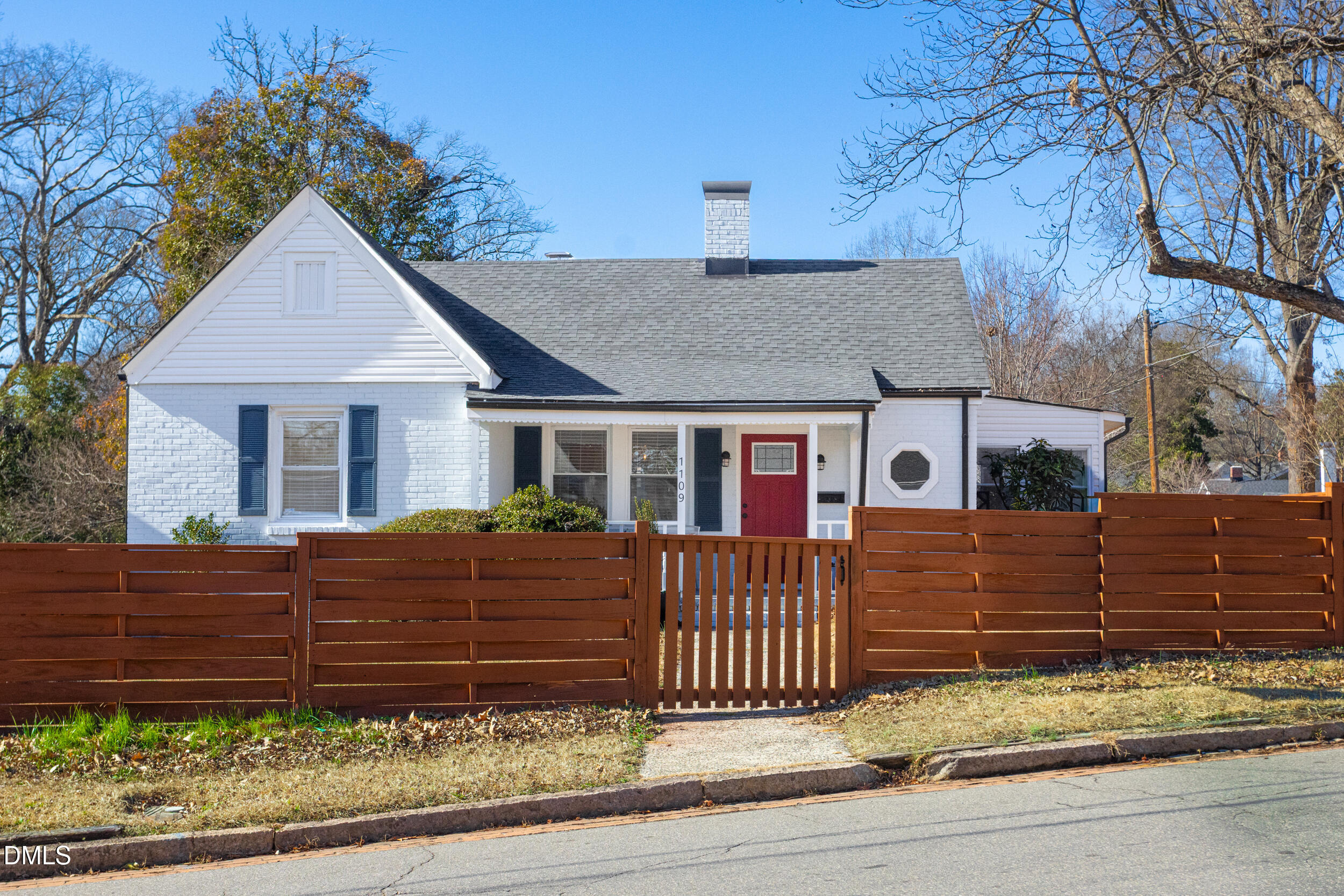 1109 North Elizabeth Street Durham, NC 27701 - Photo 7 of 44 a front view of a house with a yard