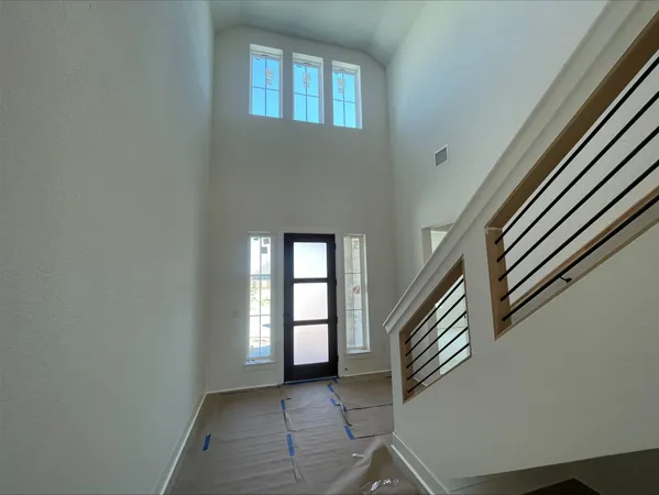 a view of an entryway with staircase