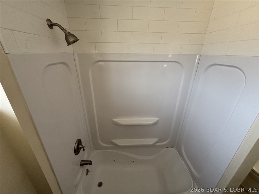 1265 Lick Creek Road Edwards, MO 65326 - Photo 22 of 29 upper level jetted tub/shower