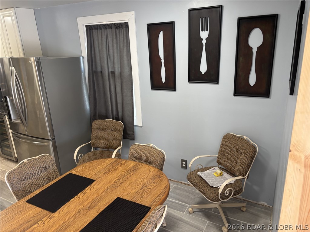 1265 Lick Creek Road Edwards, MO 65326 - Photo 9 of 29 view of dining from sunroom