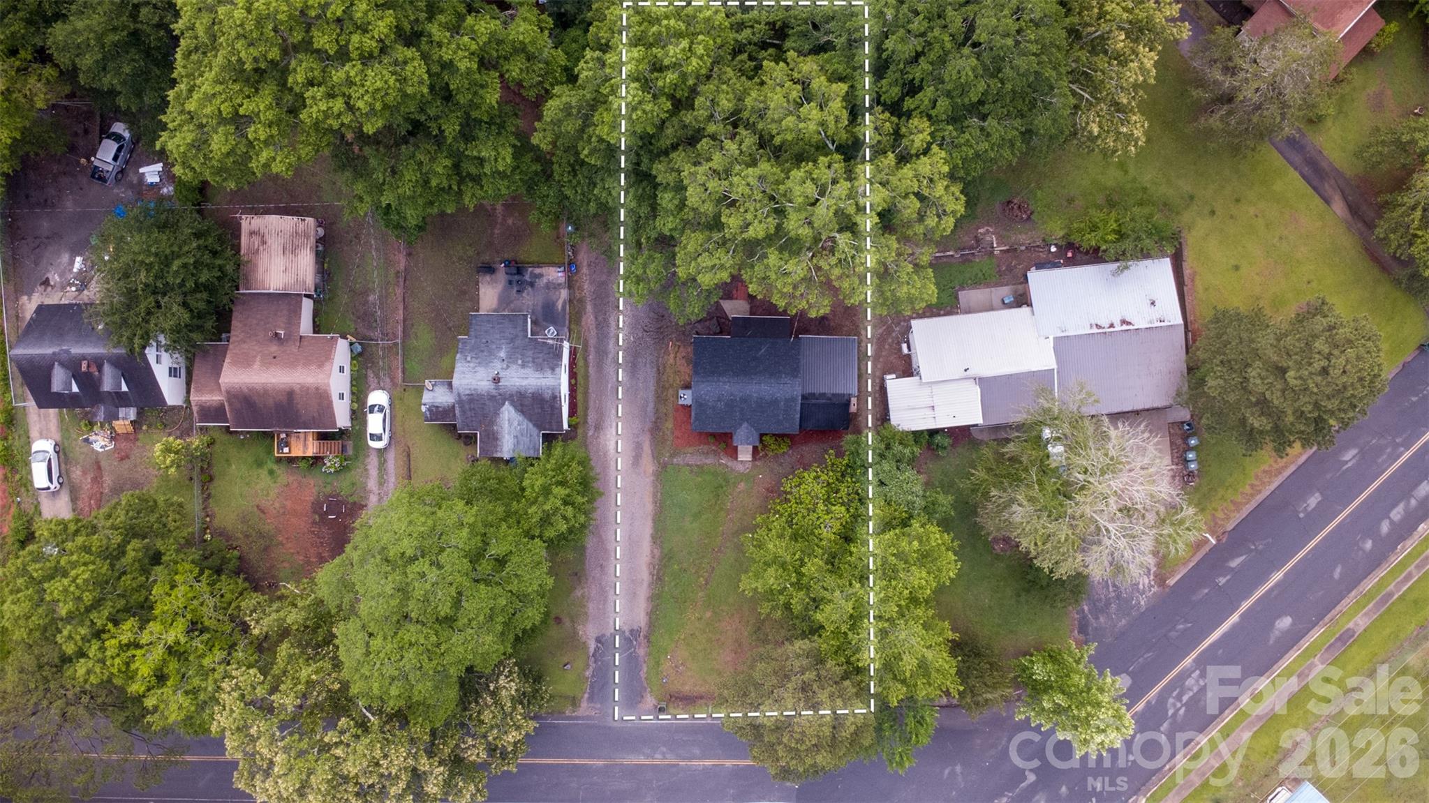 128 Ella Street Chester, SC 29706 - Photo 11 of 18 an aerial view of a house with a garden and yard