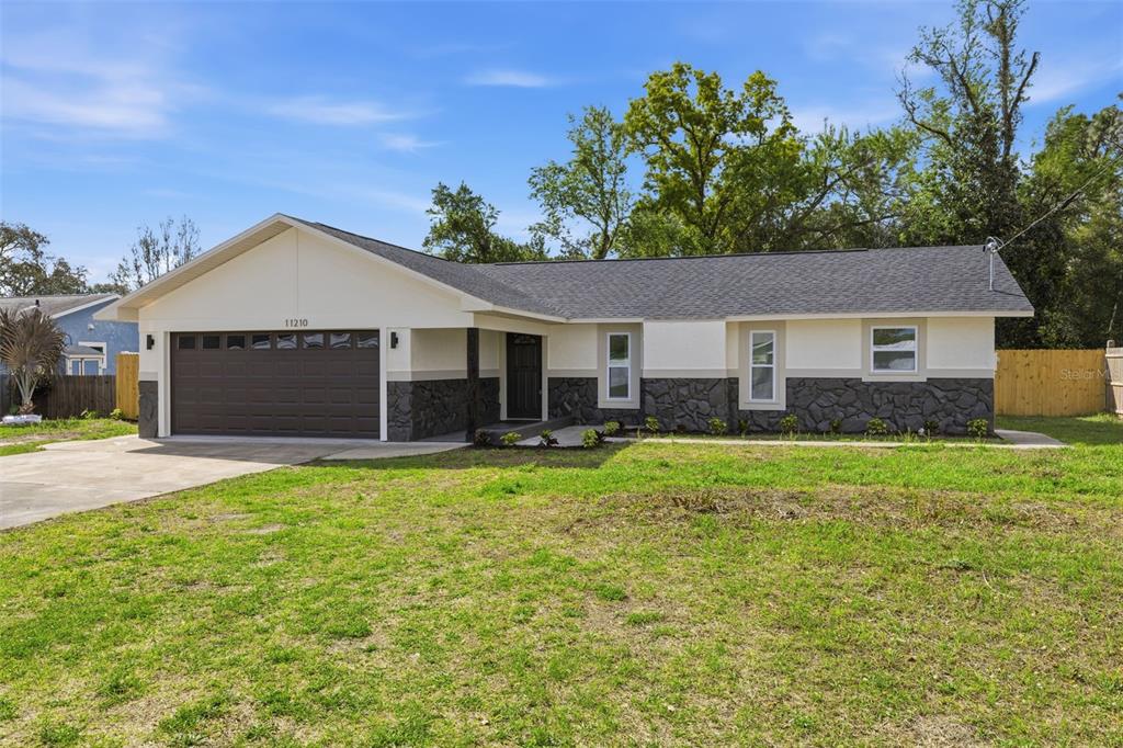 11210 Mercedes Street Spring Hill, FL 34609 - Photo 2 of 46