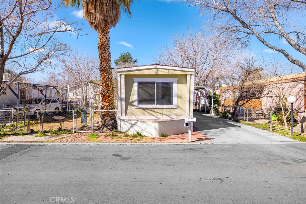 43850 20th Street East, Unit 265 Lancaster, CA 93535 - Photo 1 of 19 a view of outdoor space yard and basketball court