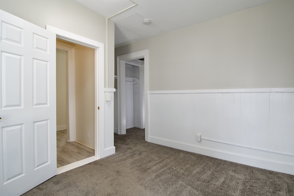 58 Howes Street, Unit 1 Springfield, MA 01118 - Photo 23 of 24 an empty room with closet