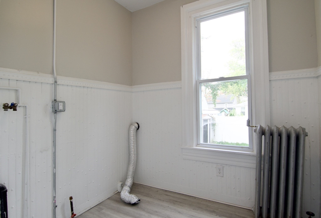 58 Howes Street, Unit 1 Springfield, MA 01118 - Photo 10 of 24 a view of an empty room with a window
