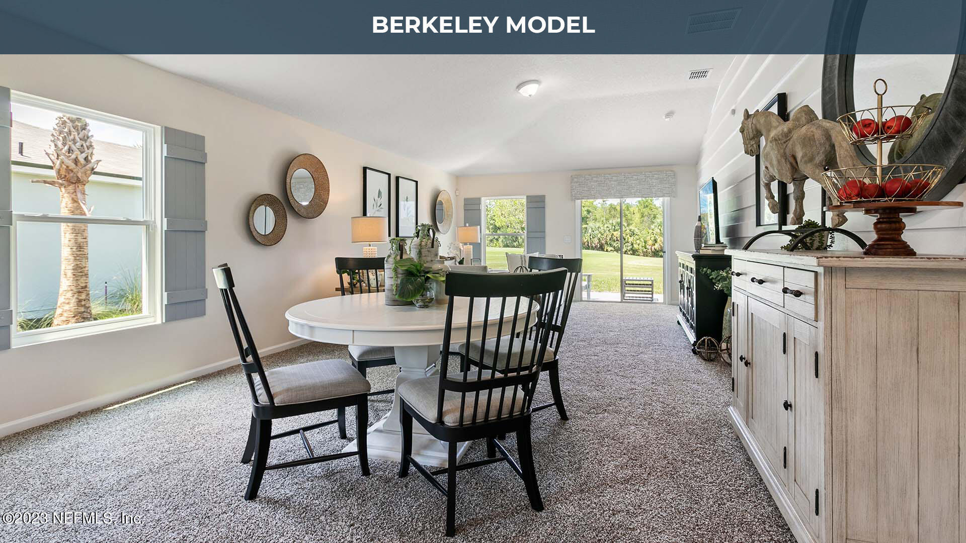 57 Windsor Lane St. Augustine, FL 32084 - Photo 7 of 28 a view of a dining room with furniture window and wooden floor