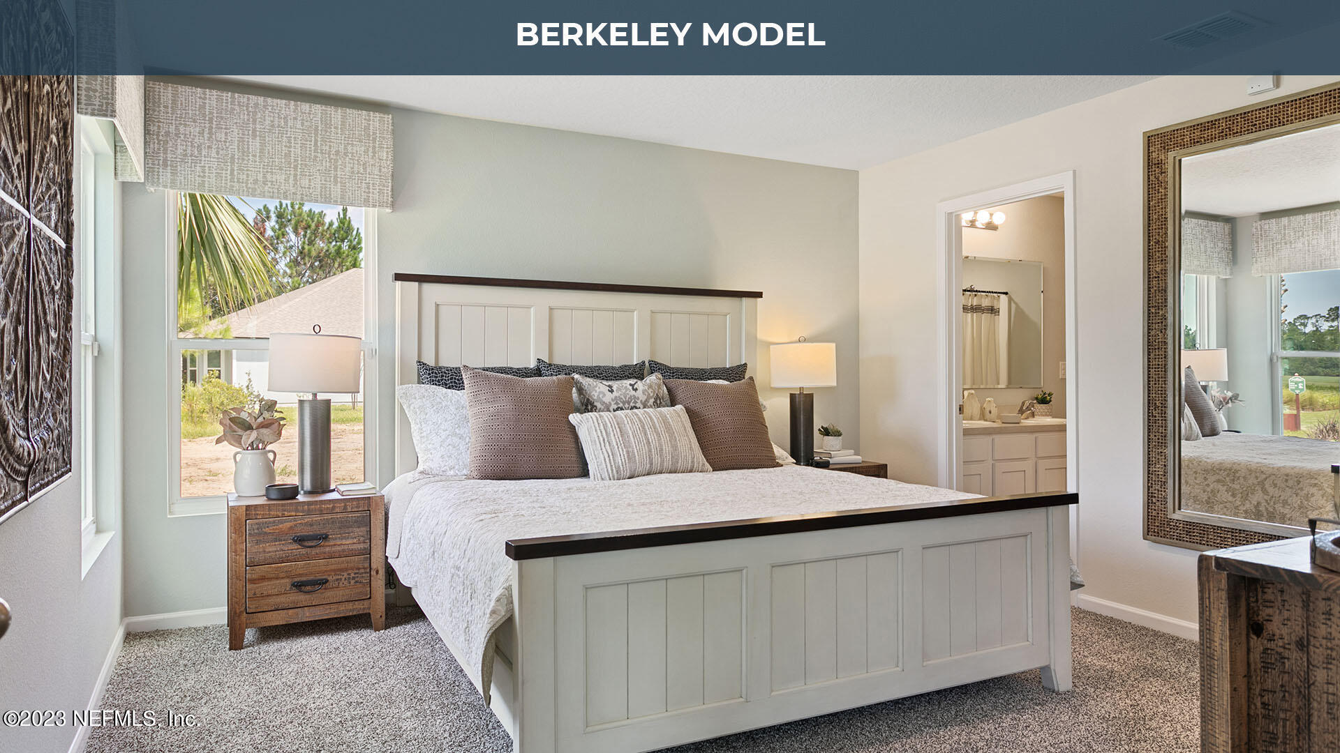 57 Windsor Lane St. Augustine, FL 32084 - Photo 10 of 28 a bedroom with a bed and a night stand