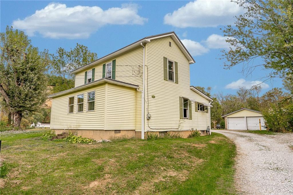 114 Post Road Dilliner, PA 15327 - Photo 13 of 50 a front view of a house with a yard