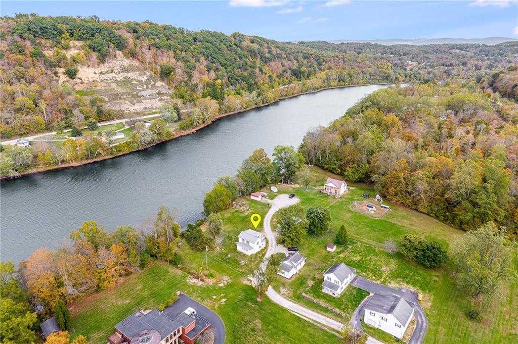 114 Post Road Dilliner, PA 15327 - Photo 16 of 50 a view of a lake with a mountain in the background