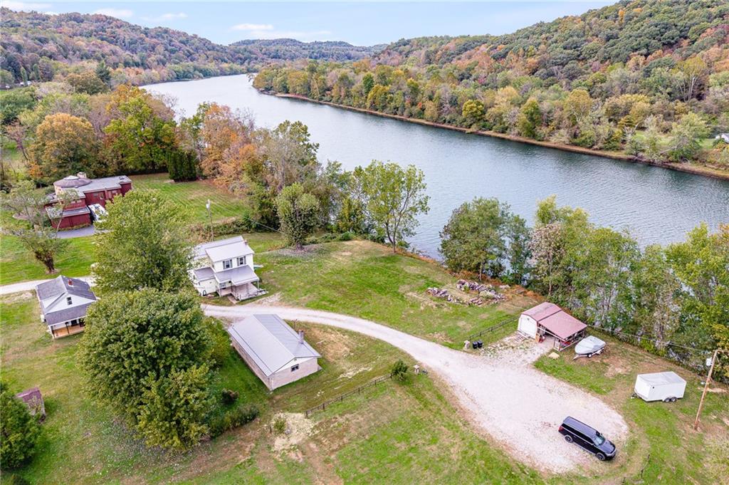 114 Post Road Dilliner, PA 15327 - Photo 22 of 50 a view of a lake with a mountain