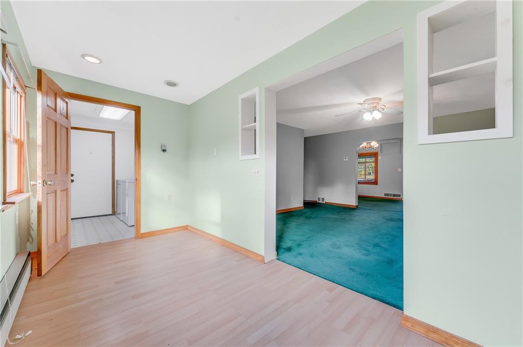 114 Post Road Dilliner, PA 15327 - Photo 36 of 50 a view of a big room with wooden floor and windows