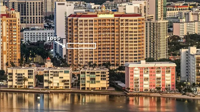 a view of swimming pool with outdoor seating