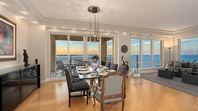 a view of a dining room with furniture window and outside view