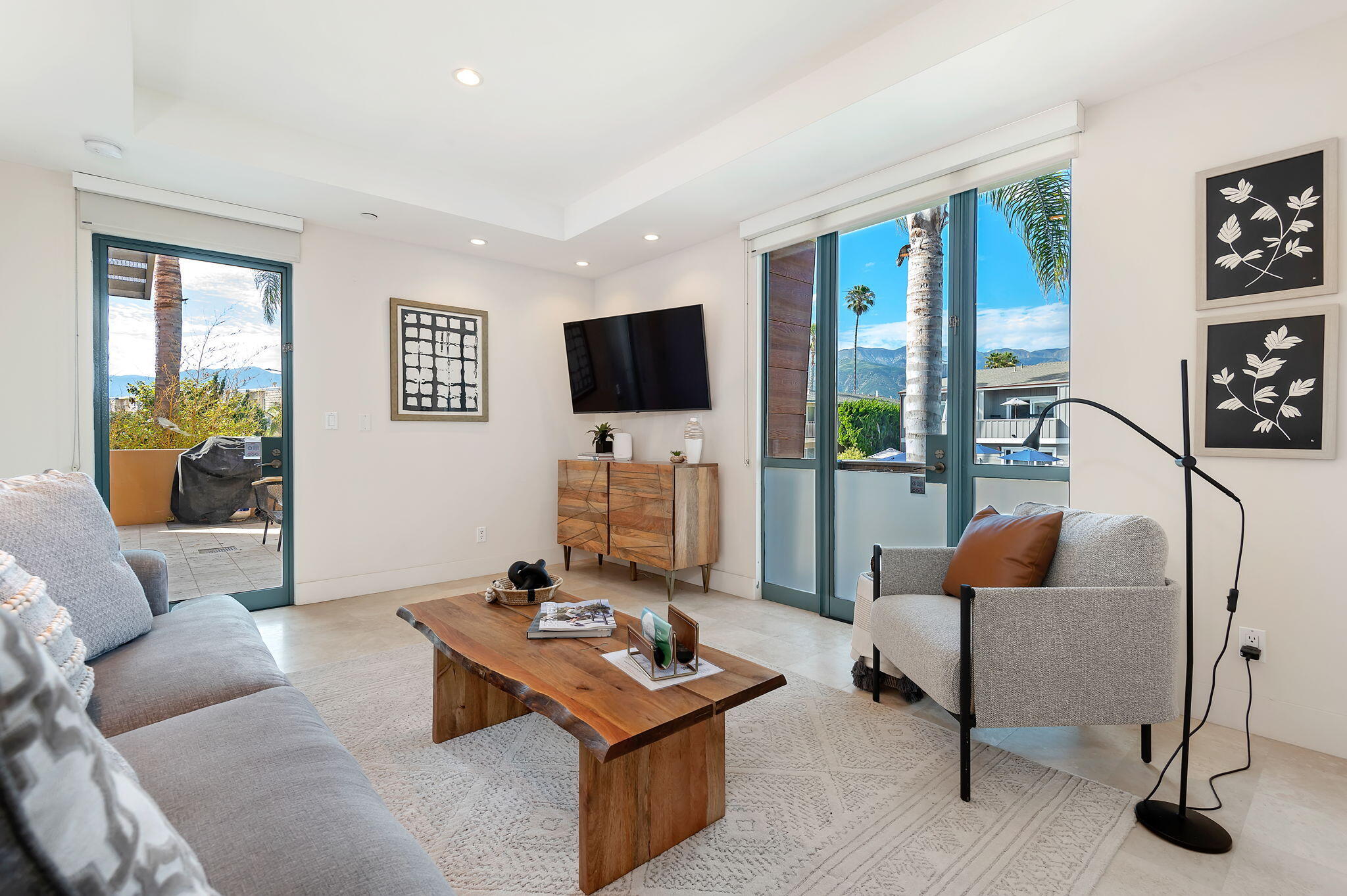 4815 Sandyland Road, Unit A Carpinteria, CA 93013 - Photo 13 of 29 a living room with furniture and a flat screen tv