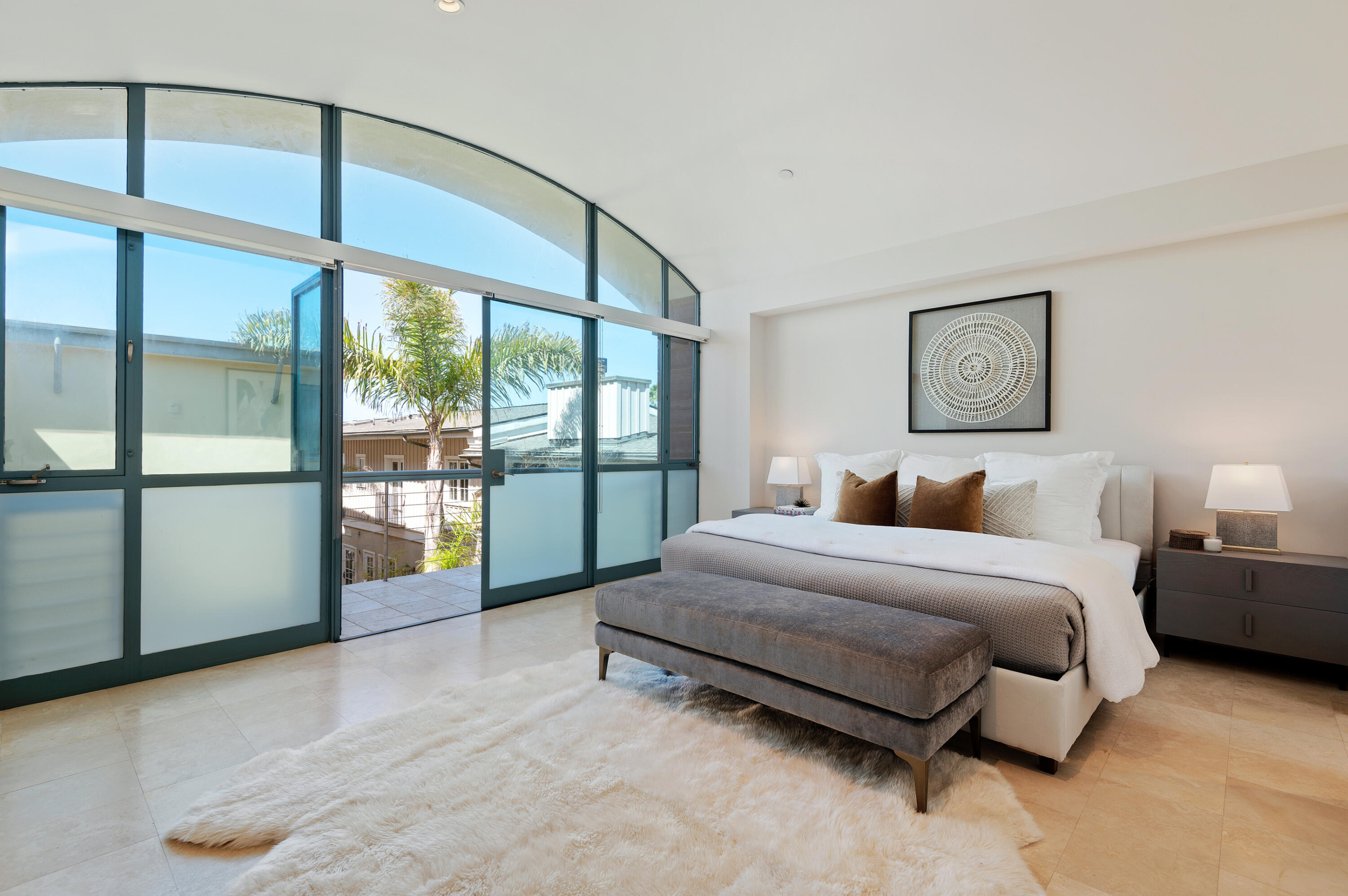 4815 Sandyland Road, Unit A Carpinteria, CA 93013 - Photo 15 of 29 a spacious bedroom with a bed and large window