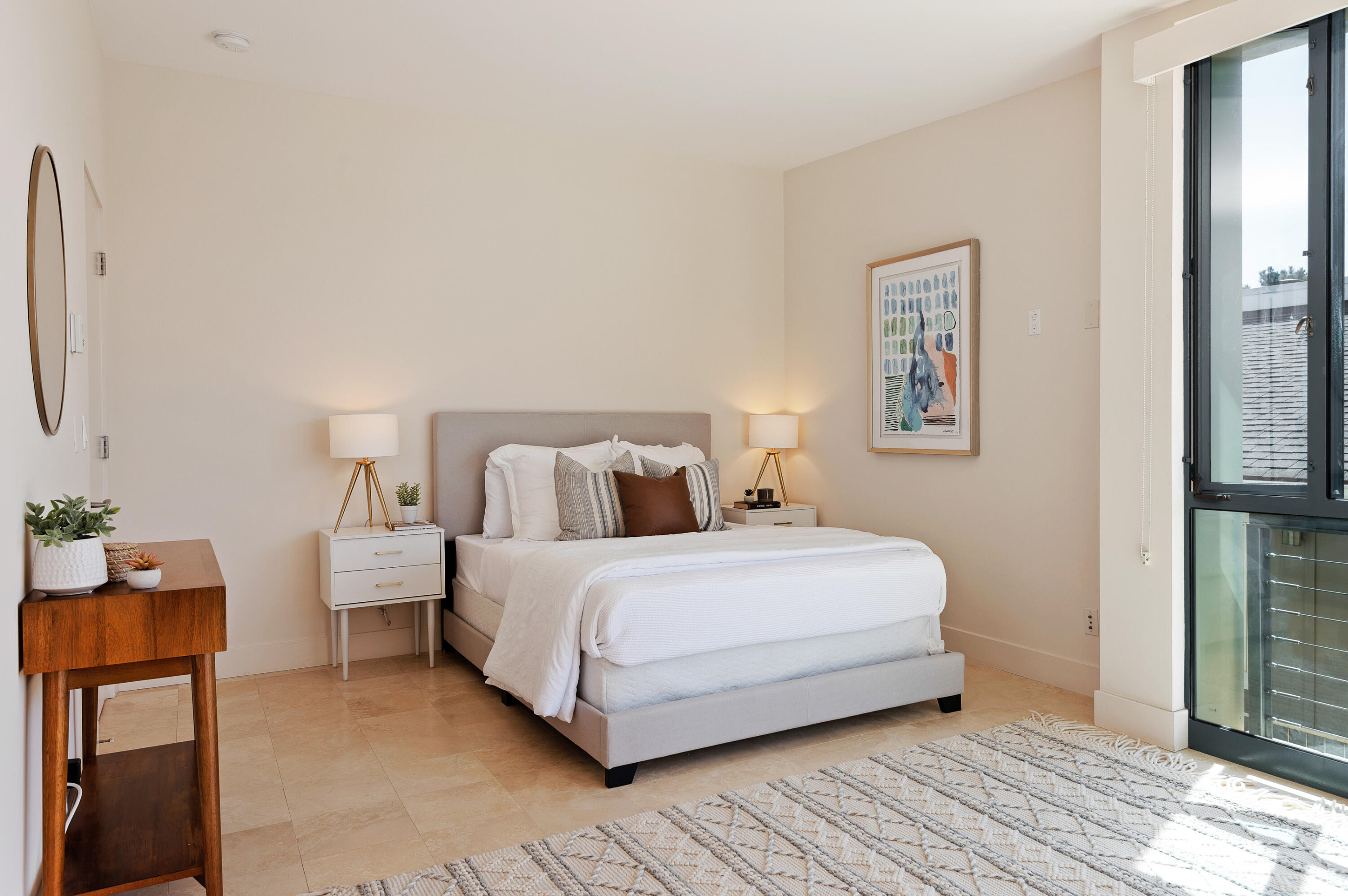 4815 Sandyland Road, Unit A Carpinteria, CA 93013 - Photo 18 of 29 a bedroom with a bed and a table