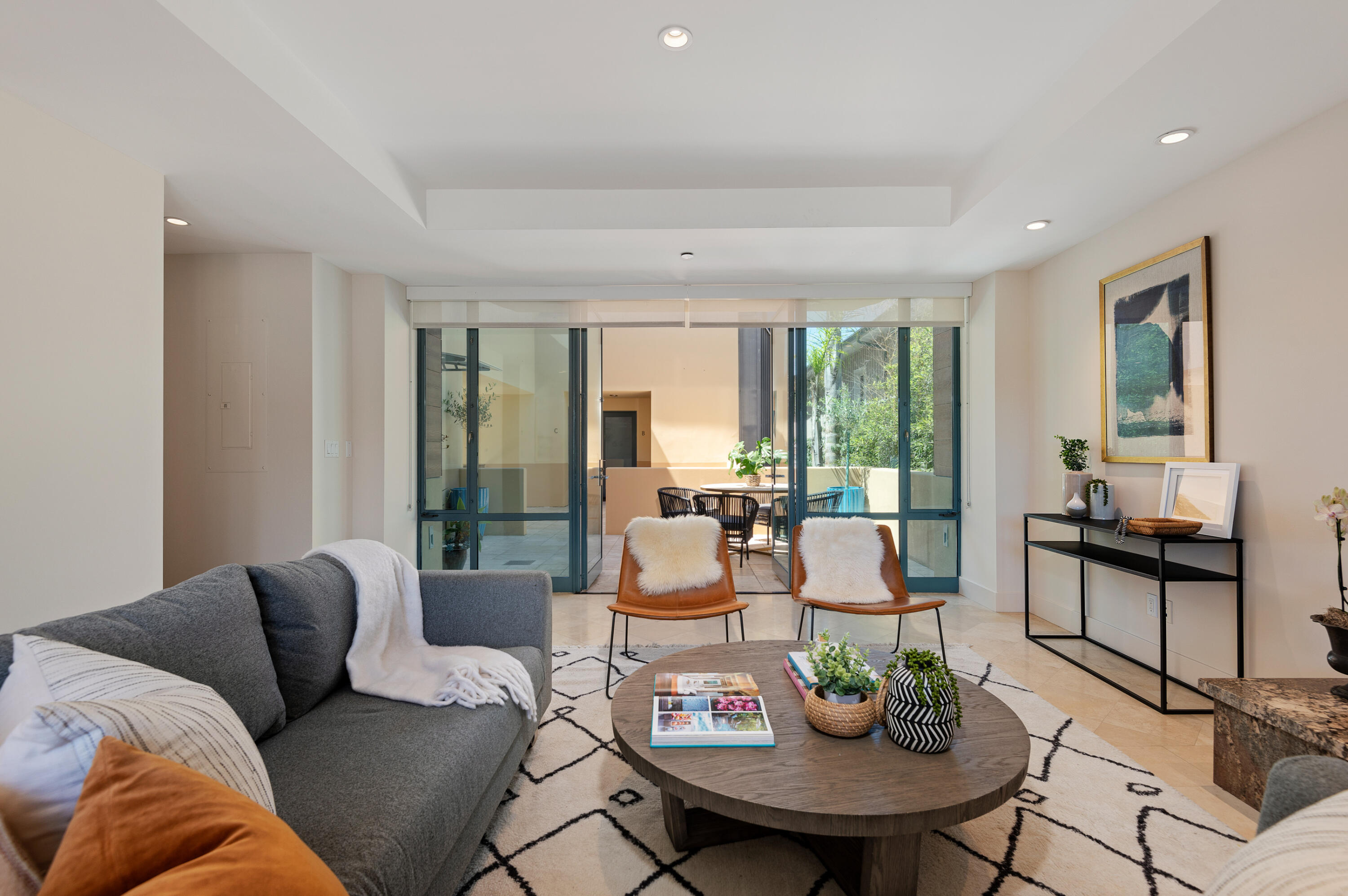 4815 Sandyland Road, Unit A Carpinteria, CA 93013 - Photo 7 of 29 a living room with furniture and a large window