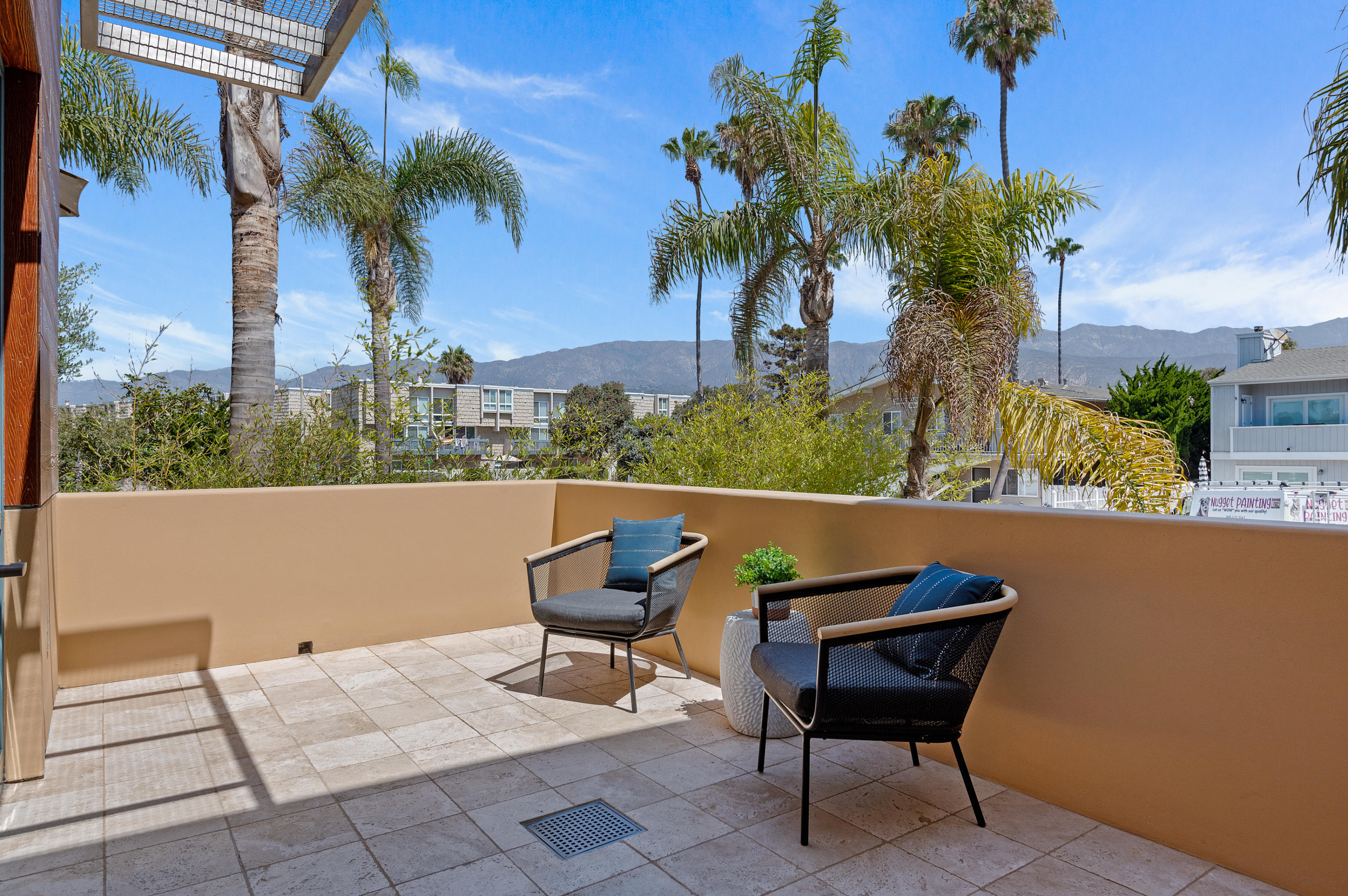 4815 Sandyland Road, Unit A Carpinteria, CA 93013 - Photo 8 of 29 a view of a outdoor sitting area with furniture and wooden fence