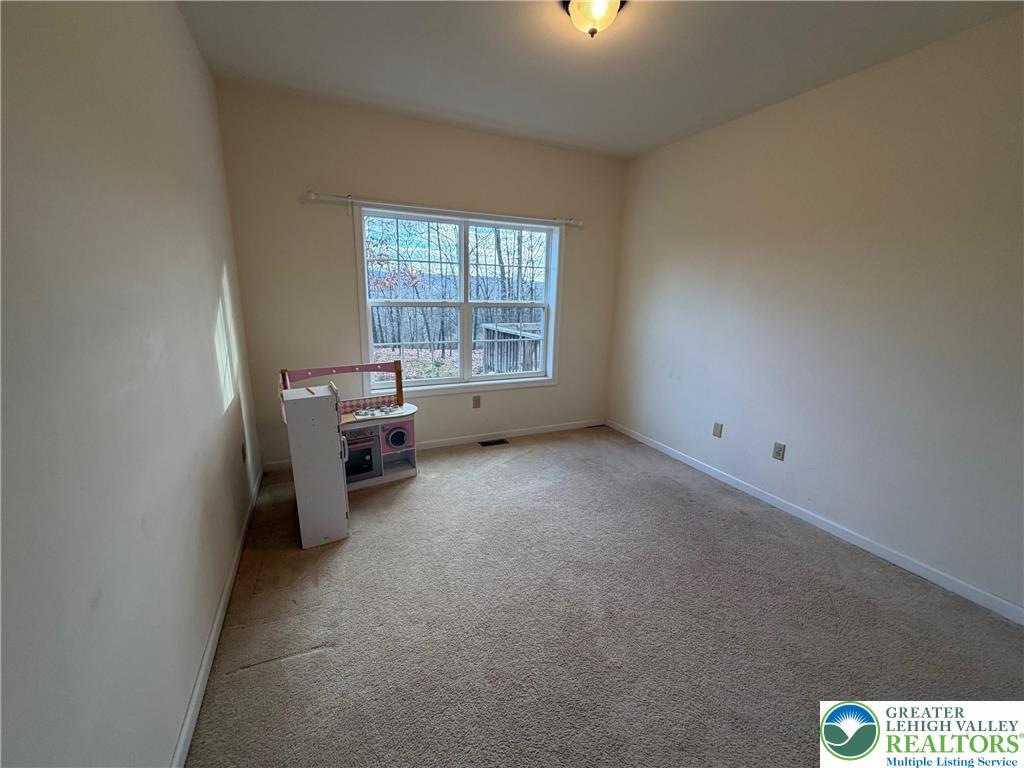 106 Hilda Court East Stroudsburg, PA 18301 - Photo 19 of 33 a view of a livingroom with a window