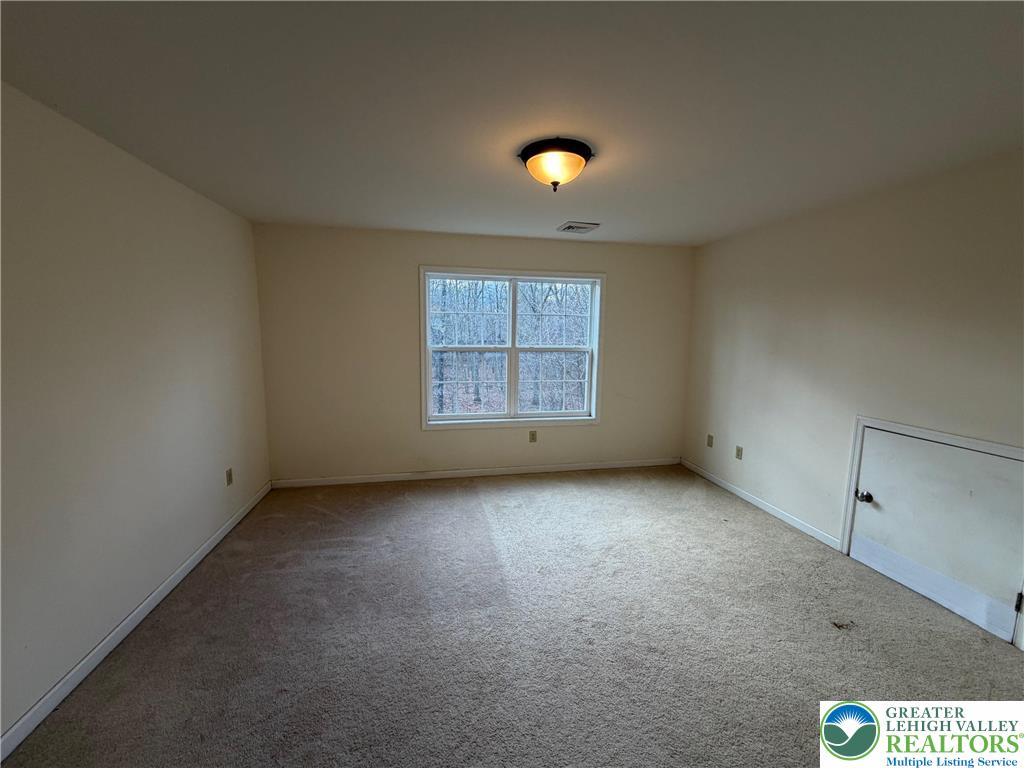 106 Hilda Court East Stroudsburg, PA 18301 - Photo 21 of 33 an empty room with a window