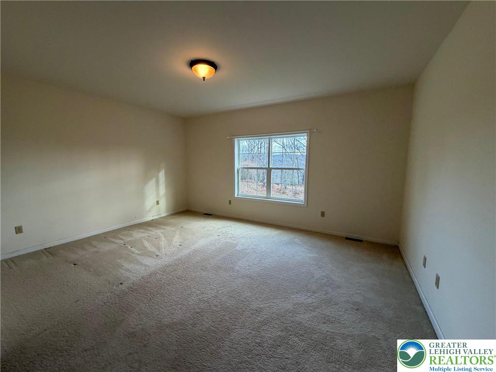 106 Hilda Court East Stroudsburg, PA 18301 - Photo 24 of 33 an empty room with windows