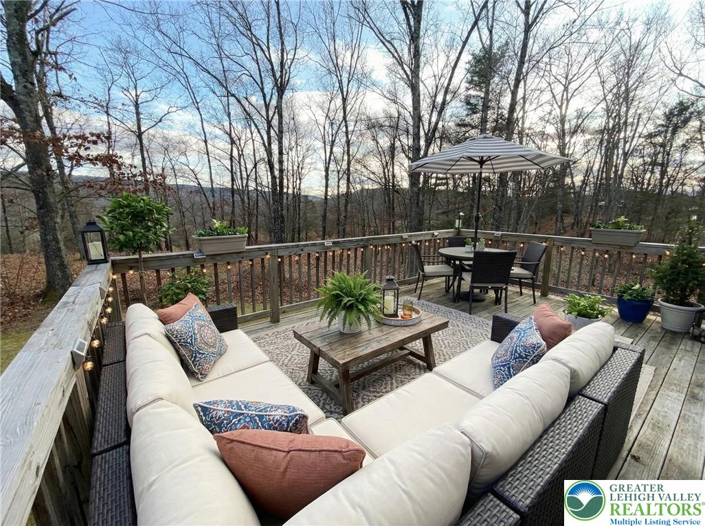 106 Hilda Court East Stroudsburg, PA 18301 - Photo 30 of 33 a view of a patio with couches and a fire pit
